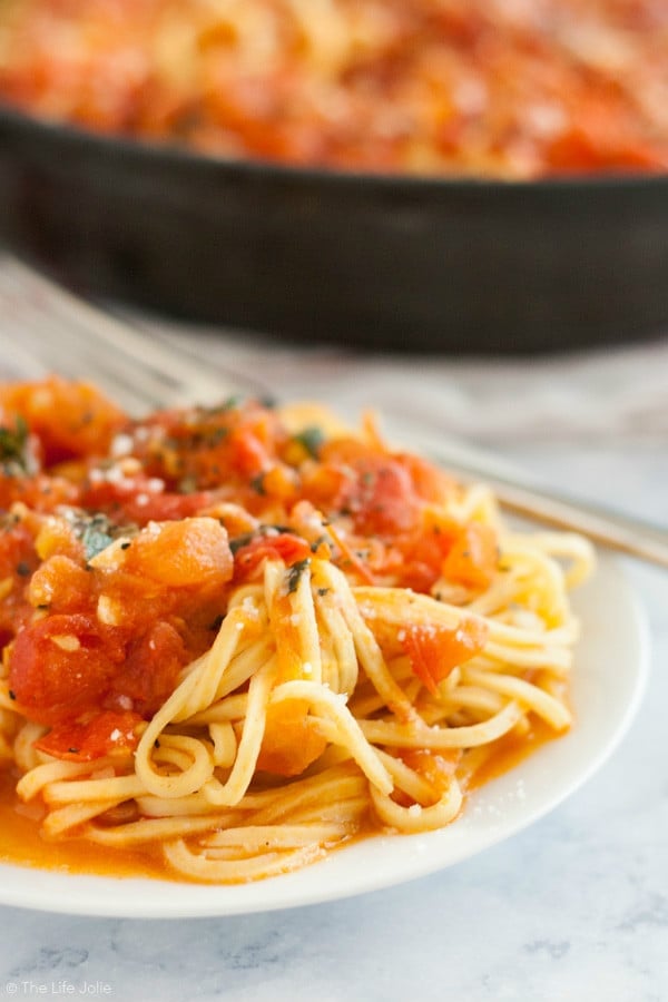 This Pasta Pomodoro recipe is a simple pasta. The flavors of deliciously fresh tomatoes, basil and garlic come together in a sauce for this quick and easy weeknight meal.