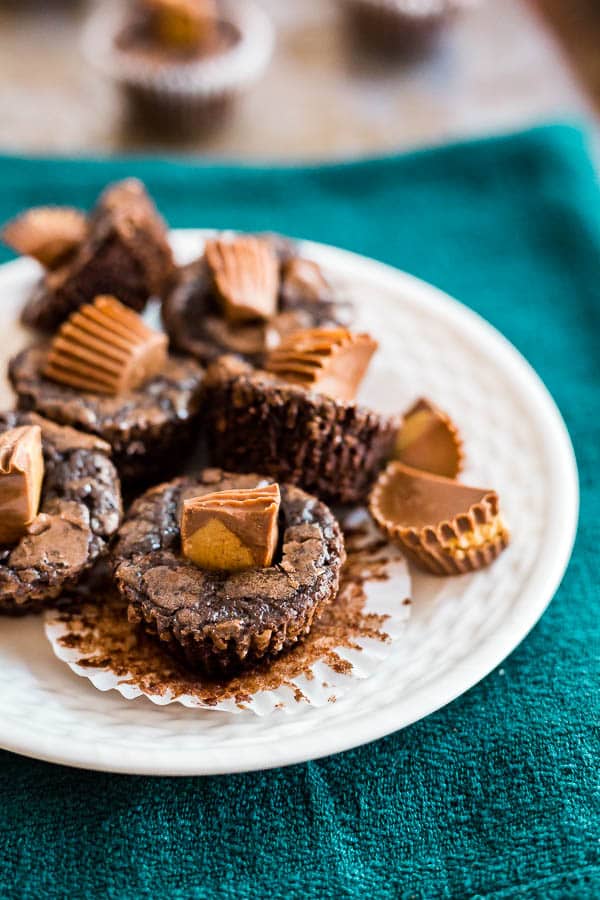 A view of the side of a plate of Peanut Butter Cup Brownie Bites.