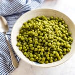 Peas with Onions is the most easy side dish! With a few simple ingredients, this recipe is a snap to throw together on a busy week night but delicious enough to serve at a gathering or with a holiday dinner.