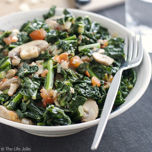 Sautéed Kale with Mushrooms and Tomatoes is the best healthy side dish. It whips up super quickly and easily and tastes fantastic! This also makes a satisfying vegetable main dish.