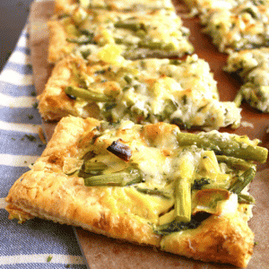 This Asparagus and Leek tart has the most amazing flavor combination from the addition of Gruyere cheese and fresh herbs. It is quick and easy to put together and the results are delicious!