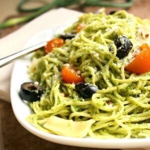 Garlic Scape Pesto is a tasty twist on a regular pesto. If you like garlic, you have got to try this! It's great over pasta as well as on meat. Click on the photo to read more...