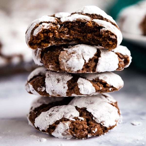This Chocolate Crinkle Cookies recipe is a holiday family favorite- they're deliciously chewy, chocolate cookies that are super easy to make and a definite crowd-pleaser! These cookies are perfect on a Christmas cookie platter and are the best addition to any special occasion dessert table.