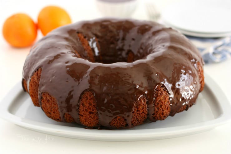 This Orange Cake with Chocolate Ganache Glaze is super easy to make. It's a cake mix hack recipe that comes out so moist and delicious- this one's a keeper!