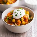A square image of Moroccan Chickpea Vegetarian Stew.
