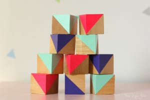 These DIY painted blocks are a fun way to add a decorative, colorful accent into a kids room or nursery. They're very easy to make with this simple tutorial and look so cute!