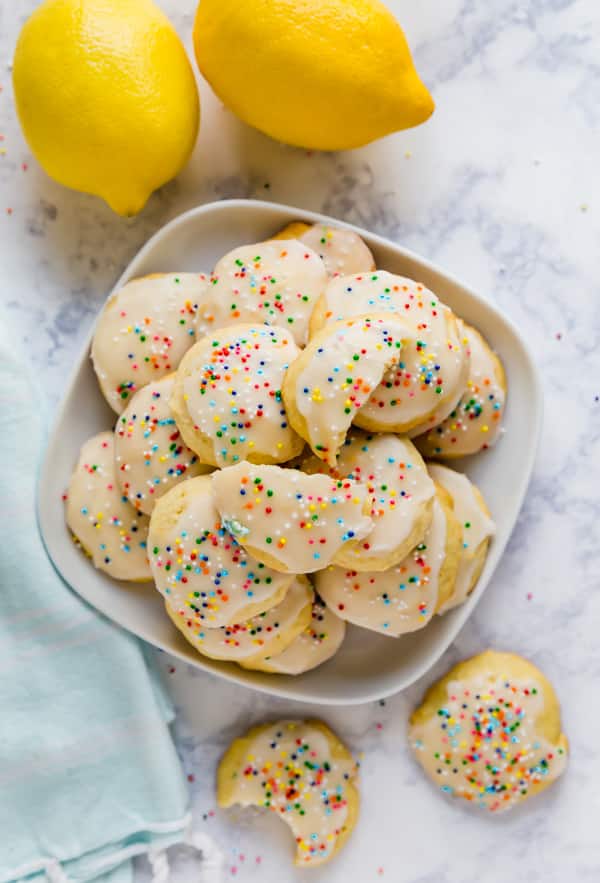 An overhead image of a plate of sour cream sugar cookies