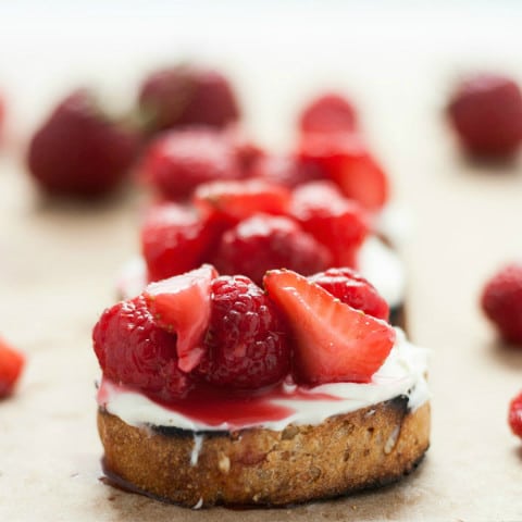 This Summer Berry Dessert Crostini recipe is a light and delicious summer dessert. You can also call it dessert bruschetta. It uses ripe summer berries, mascarpone cheese sweetened with honey and grilled baguette. This easy dessert is super quick to make and a real crowd pleaser!