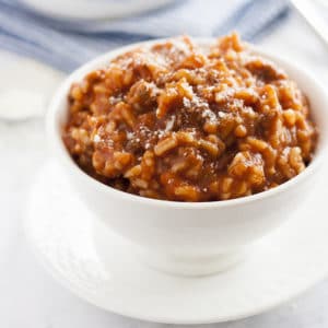 This easy Spanish Rice recipe has been a mainstay in my family for as long as I can remember. It's a really quick recipe which makes it perfect to make on a weeknight and is great for back-to-school. Delicious tomato sauce combines so well with ground beef and rice- the whole family will love this homemade, healthy meal!