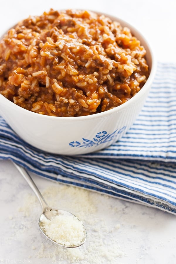 This easy Spanish Rice recipe has been a mainstay in my family for as long as I can remember. It's a really quick recipe which makes it perfect to make on a weeknight and is great for back-to-school. Delicious tomato sauce combines so well with ground beef and rice- the whole family will love this homemade, healthy meal!