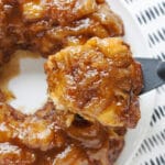 Orange Roll Monkey Bread is an easy and delicious twist on a family favorite recipe. It's so simple to transform refrigerated Orange Cinnamon rolls in to a sweet and gooey pull apart bread. This is a great Christmas morning breakfast and easy enough to make the night before as well!