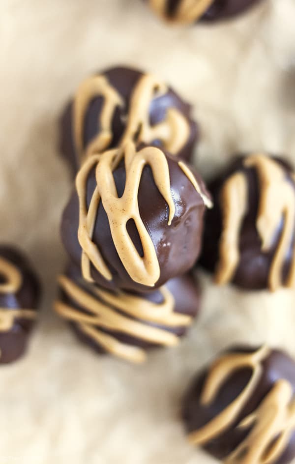 These Peanut Butter Brownie Truffles are an easy chocolate dessert recipe and an excellent gift to give this for Valentine's Day. This simple recipe is made with rich, fudgy brownies and a peanut buttery surprise in the middle.