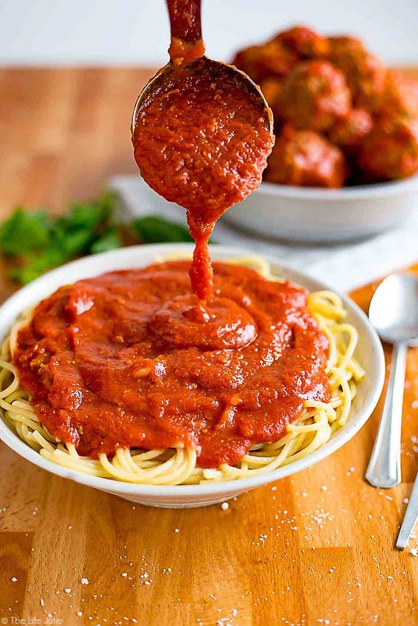 This is part two of the only Meat Sauce recipe you’ll ever need. It’s an extremely detailed (but still simple and easy) recipe for my Grandma’s homemade, Italian Sunday Sauce and this seriously is the very best sauce you’ll ever taste. This second part is all about adding the meatballs and fall-apart-tender pork for your sauce as well as the secret ingredient and putting it all together!