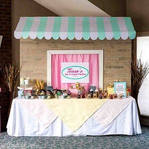 This DIY Awning and table backdrop a simple and fun way to decorate a dessert bar at your next party or event. The background and awning are pretty easy to make and you can click on the photo to get full directions and plans to make this from start to finish! Your guests will be wowed!
