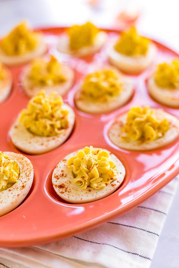 Here's an easy tutorial for how to make Basic Deviled Eggs. This recipe is the best simple method to make this classic, delicious appetizer. These are a great way to use up extra Easter eggs and are perfect to bring to a picnic or get-together!