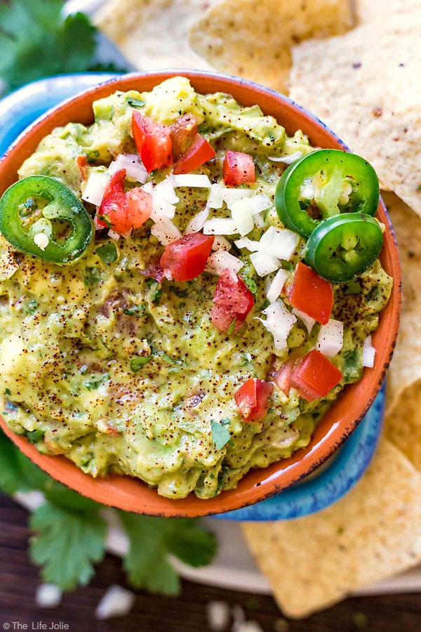 It's always a good idea to have an easy guacamole recipe up your sleeve and this one is seriously the best- fantastic, zesty flavor with an awesome secret ingredient to helps take the guacamole to the next level. It's a healthy snack for any celebration or game day!