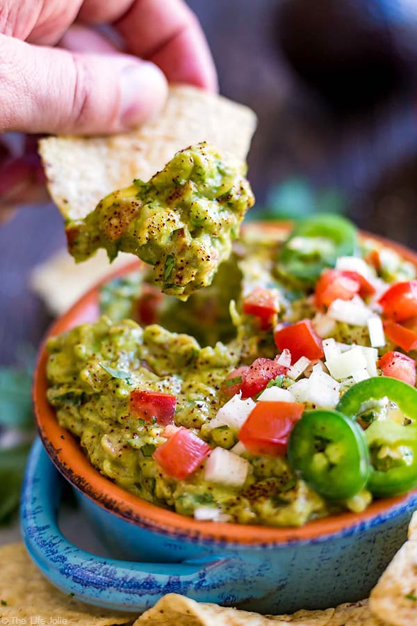 It's always a good idea to have an easy guacamole recipe up your sleeve and this one is seriously the best- fantastic, zesty flavor with an awesome secret ingredient to helps take the guacamole to the next level. It's a healthy snack for any celebration or game day!