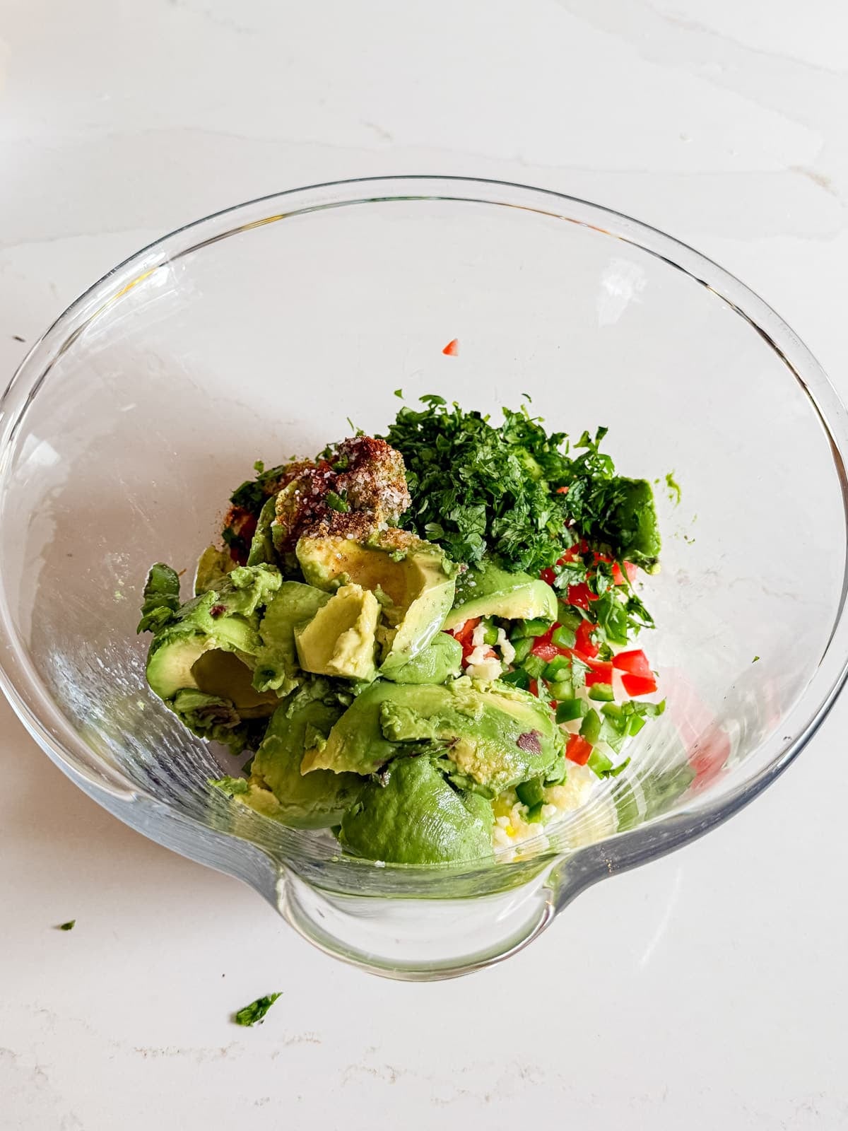 Guacamole ingredients in a bowl.