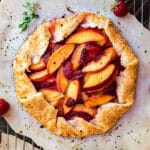 A square image of Nectarine and Strawberry Galette with Thyme.