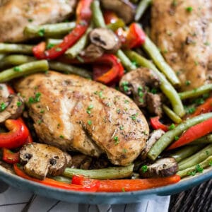This One Pot Balsamic Chicken Recipe is one of the most healthy, quick and easy weeknight dinner recipes around! Made with chicken, green beans, red peppers, mushrooms, and balsamic vinegar, it's also great for meal prep!!