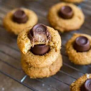 A square image of Salted Caramel Blossoms Cookies.