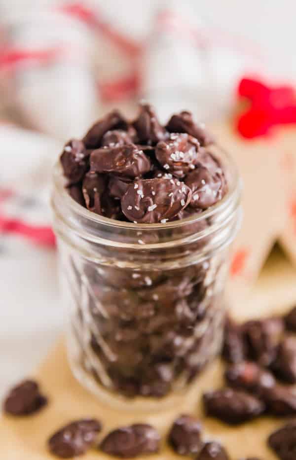 A jar of Chocolate Almond Candy with salt on top