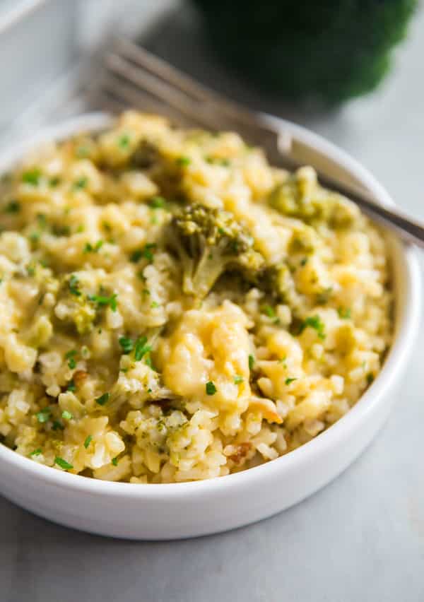 A close up image of a plate of Cheesy Broccoli Rice Casserole.