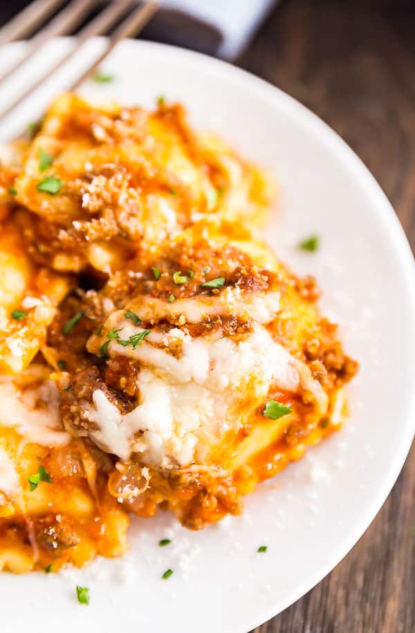 A close up image of one of the cheese ravioli in this baked ravioli dish.