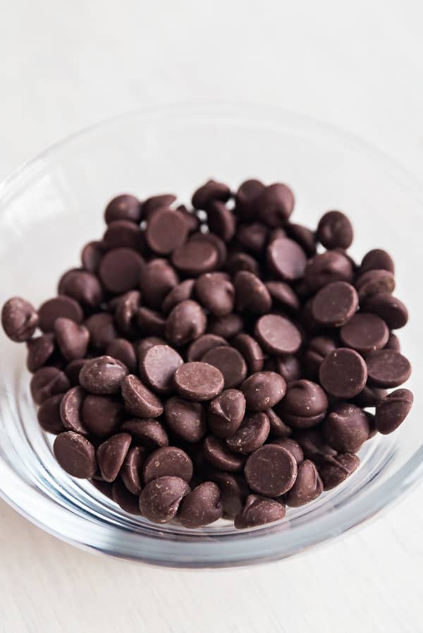 A bowl of chocolate chips that will turn into melted chocolate.