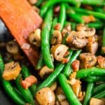A square image of Sauteed Green Beans with Mushrooms, Shallots and Pancetta.