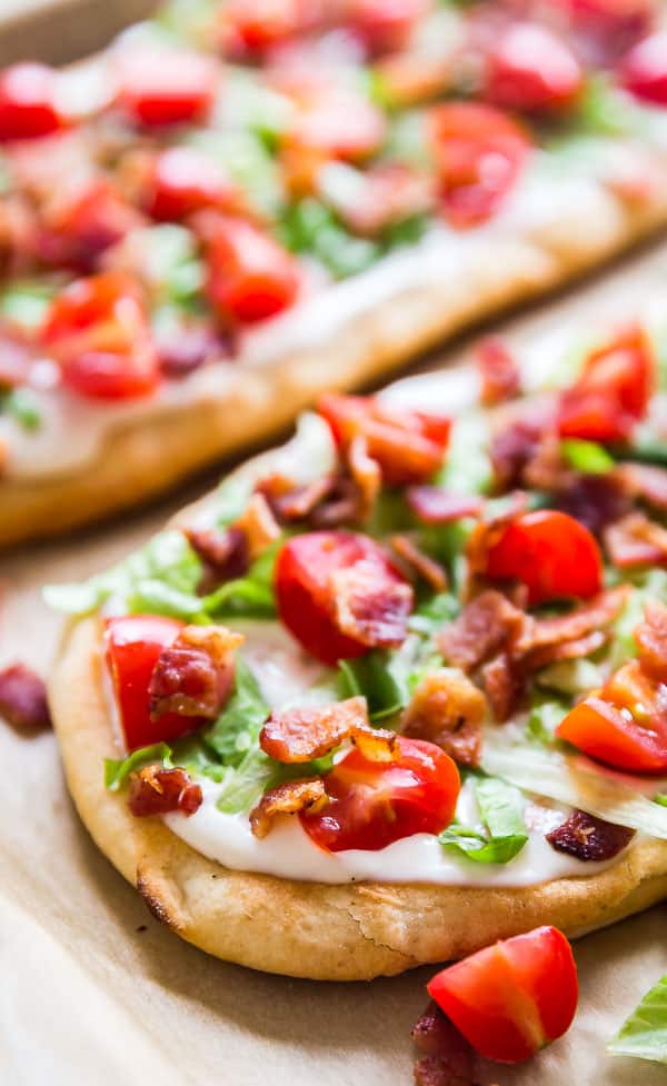 A close up shot of BLT Ranch Flatbread Pizza on a pan.