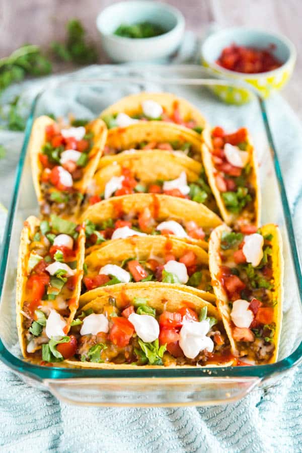 A pan full of Ground Beef Oven Baked Tacos.