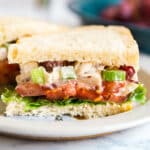 Copycat Panera Bread Napa Almond Chicken Salad Sandwich is one of my favorite light lunches. Made with grapes, almonds and celery, it's seriously quick and easy to make and a great way to repurpose leftover chicken!