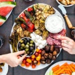 What's the best way to enjoy this gorgeous summer weather? A girl's night on the deck of course! So grab your best girlfriends and enjoy this Summer Antipasto Platter. Full of cheese, meat, olives and plenty of delicious grilled vegetables it's SO easy to make and crazy delicious!