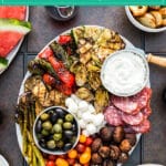 What's the best way to enjoy this gorgeous summer weather? A girl's night on the deck of course! So grab your best girlfriends and enjoy this Summer Antipasto Platter. Full of cheese, meat, olives and plenty of delicious grilled vegetables it's SO easy to make and crazy delicious!