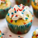 Firecracker Vanilla Cupcakes are the most fun kid's dessert the 4th of July- you'll love the POP ROCKS hidden inside for a totally fun surprise when you bite into them. These are a must-make and are SO easy!
