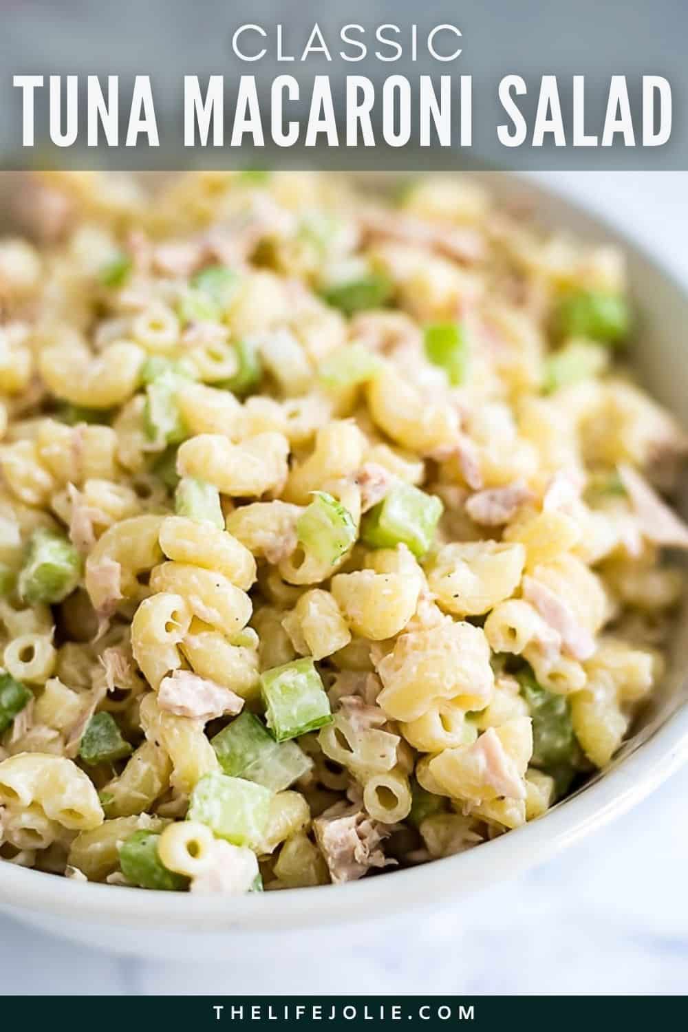 A close up image of a bowl zooming in on the details of tuna macaroni salad.