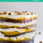 This Kahlua Toffee Chocolate Trifle Recipe is the ultimate make-ahead dessert. Made with chocolate cake, Coffee Liquor, vanilla pudding, whipped topping and toffee bars, it's so addictive that your family will be fighting for seconds!