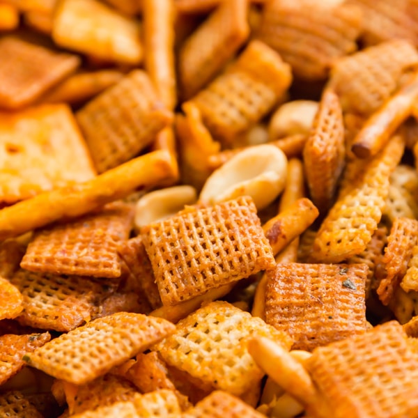 This Buffalo Chex Mix recipe brings the crunchy goodness of Original Chex Mix but with a spicy Buffalo kick that we all love- it's down right addictive!