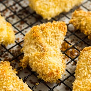 These baked fish sticks are an easy homemade version of the childhood meal we all know and love. Tender white fish with a crispy panko crust, they're are a quick and delicious dinner the whole family will love! This is an excellent weeknight meal.