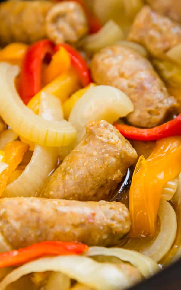 A close up image of Italian sausage and peppers and onions.