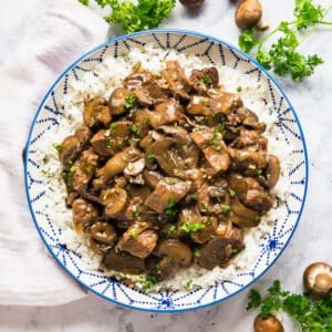 Making Beef Tips just got even easier when made in your crockpot or instant pot! This easy dump and go recipe for beef tips and rice gives you fall-apart-tender and juicy steak tips with a brown gravy that is super comforting. Get ready to watch your family fight for seconds!