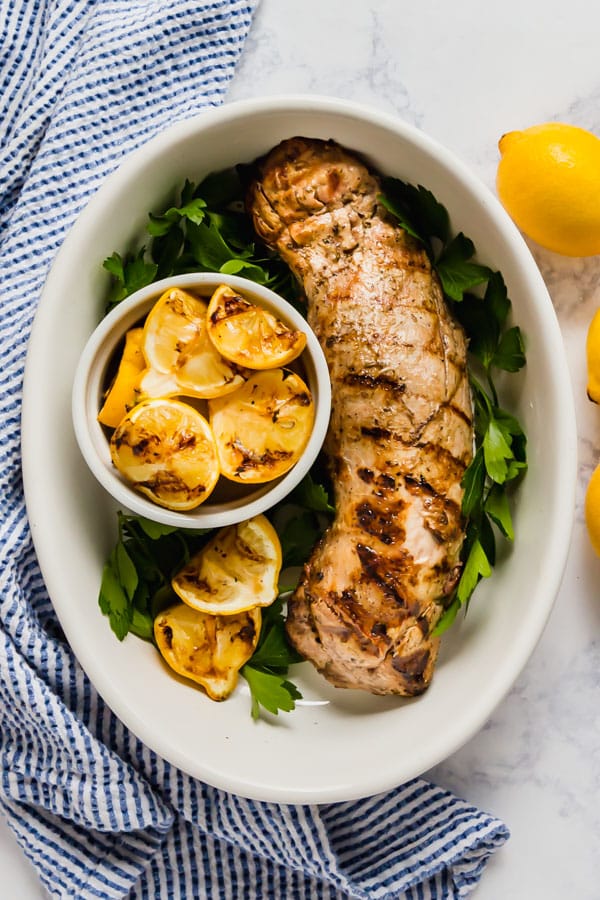 An overhead image of this grilled pork tenderloin recipe in a serving dish.
