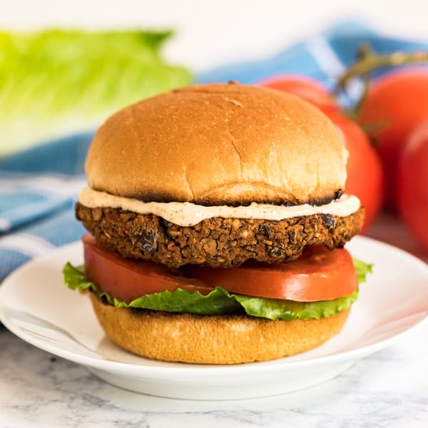 This Black Bean Burger recipe is so good, it'll turn even the biggest meat and potatoes lovers into Meatless Monday fans! Great flavor and minimal work makes these an easy and satisfying vegetarian dinner!