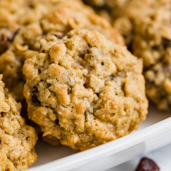 Oatmeal Raisin Cookies are a total blast from the past. Take one bite and you'll immediately be transported to those soft, delicious oatmeal cookies your mom used to make for after school snacks! They're an easy and delicious treat for the whole family.
