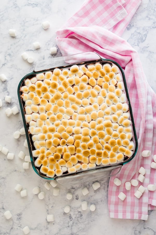 An overhead image of this icebox cake recipe in a pan surrounded by marshmallows.
