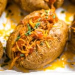 This BBQ Loaded Baked Potato Recipe is an easy throw-together dinner that's also an excellent way to repurpose leftovers. Full of all the delicious BBQ flavors we all know and love, this is a total weeknight winner!