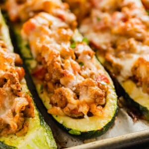 Italian Stuffed Zucchini Boats are the healthy weeknight meal you'll want to make again and again. This is a seriously easy recipe that's full of delicious flavor without all the guilt!