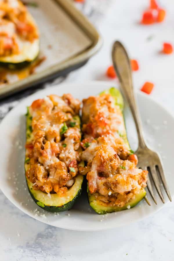 Stuffed Zucchini on a plate with a fork.