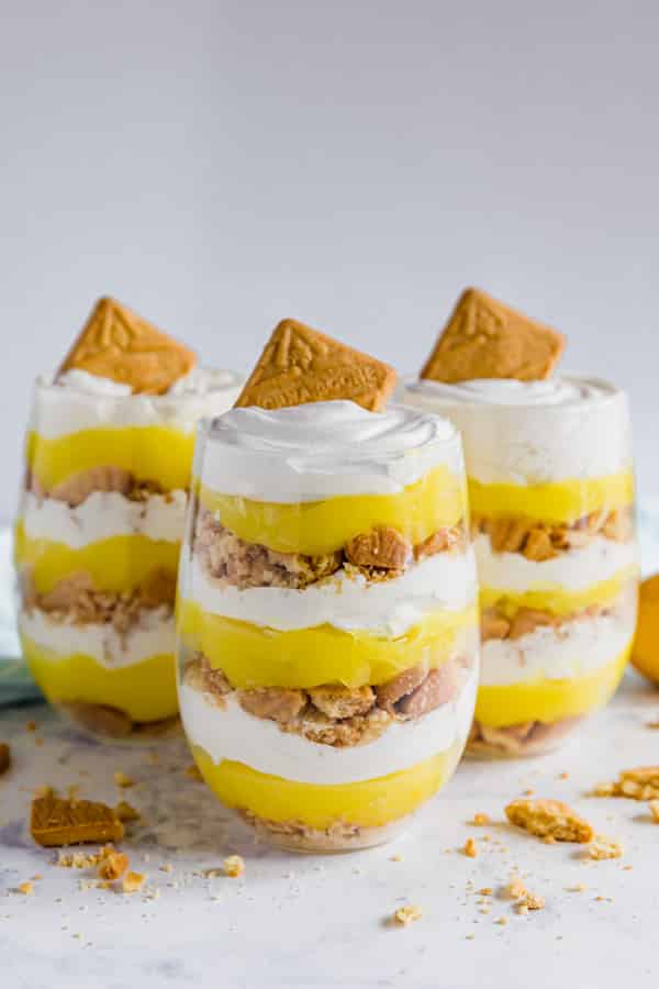 A straight-on images of 3 lemon parfaits.